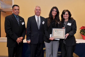 Alessandra accepting her 3rd Place Poster Award at the 2011 Induction Ceremony