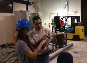 DOE Fellows Alessandra Monetti and Eric Inclan working on measurements for the test bed.