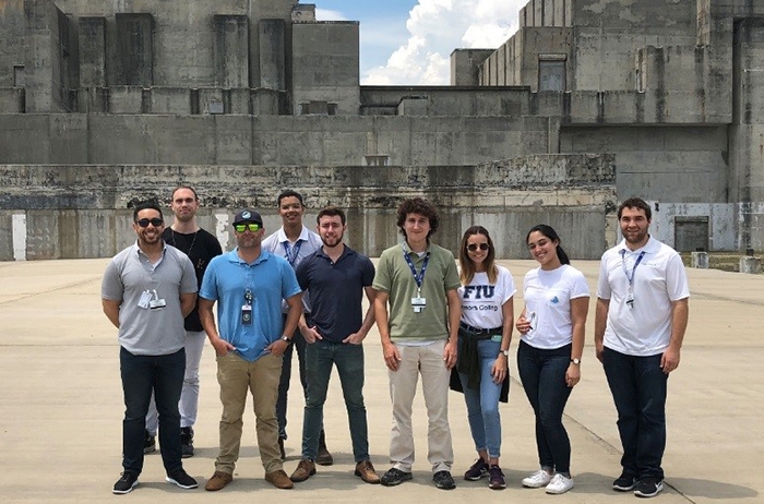 EM Technology Development Office Program and Project Manager Jean Pabón, front row, second from left, joins student interns from FIU, UT, and UPRM in front of the Savannah River Site's P Reactor.